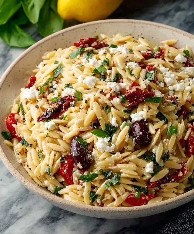 Homemade Orzo Pasta Salad with Feta and Sun Dried Tomatoes - FlirtyFood